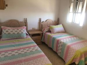 Postel nebo postele na pokoji v ubytování Sanpau