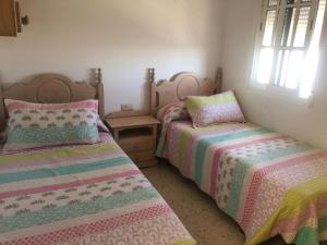 A bed or beds in a room at Sanpau