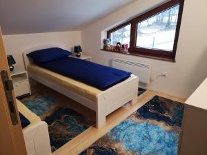 Ένα ή περισσότερα κρεβάτια σε δωμάτιο στο Mountain home JASNA