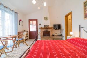 Et tv og/eller underholdning på Cottage Casa Gina - Goelba