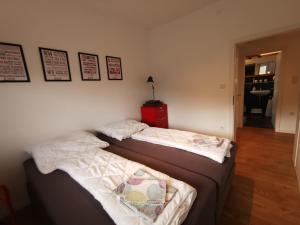 Postel nebo postele na pokoji v ubytování Ferienhaus Fräulein Frenz