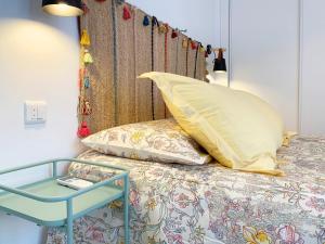 En eller flere senge i et værelse på MalagadeVacaciones - La mar salada