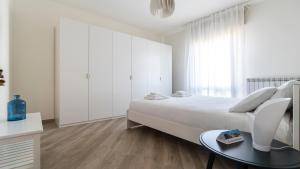 A bed or beds in a room at Italianway - Baracca 7 B