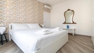 A bed or beds in a room at Italianway - Baracca 7 B