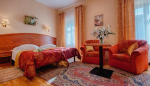 Posteľ alebo postele v izbe v ubytovaní Hotel Restauracja Caspar