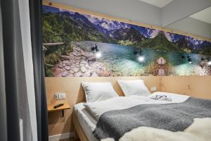 Posteľ alebo postele v izbe v ubytovaní VIP Apartamenty, ORKANA APART