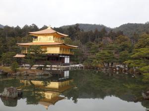 a chinese building in the middle of a lake at Kyo No Yado Nishioji inn in Kyoto