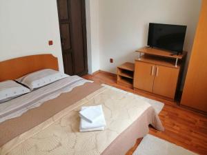 Ένα ή περισσότερα κρεβάτια σε δωμάτιο στο Casa Bia