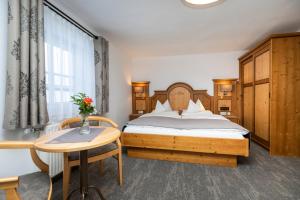 Łóżko lub łóżka w pokoju w obiekcie Frühstückspension Klinglhub