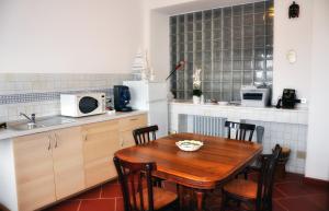 Kuchyň nebo kuchyňský kout v ubytování B&B Casa di Donna