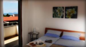 Postel nebo postele na pokoji v ubytování B&B Casa di Donna