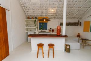 A cozinha ou cozinha compacta de Pousada Sol da Manha QUADRADO