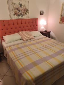 Postel nebo postele na pokoji v ubytování B&B Casa di Donna