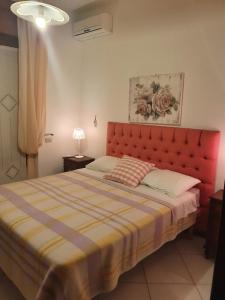 Postel nebo postele na pokoji v ubytování B&B Casa di Donna
