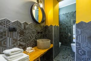 A bathroom at Starhost - MINERVA SUITE seaview
