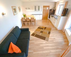 Televízia a/alebo spoločenská miestnosť v ubytovaní Haus Wöhrer / Appartement Fischbacher