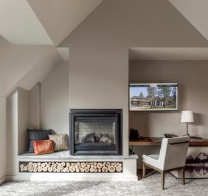 a living room filled with furniture and a fire place at Edgewood Tahoe Resort in Stateline