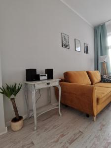 Przytulny apartament w centrum Kupiecka-Drzewna tesisinde bir oturma alanı