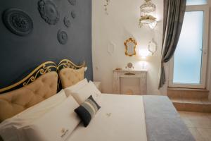 Łóżko lub łóżka w pokoju w obiekcie Magnolia