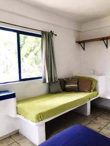 Postel nebo postele na pokoji v ubytování Hotel Posada Señor Mañana