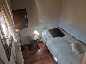 Katil atau katil-katil dalam bilik di Posada de Cabra