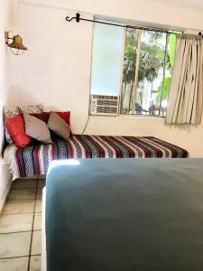 Postel nebo postele na pokoji v ubytování Hotel Posada Señor Mañana