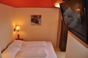 Postel nebo postele na pokoji v ubytování Hotel Carpymore