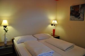 Postel nebo postele na pokoji v ubytování Hotel Carpymore