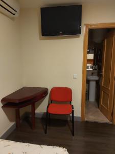TV a/nebo společenská místnost v ubytování Hostal Moncloa