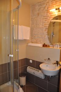 Koupelna v ubytování Hotel Carpymore