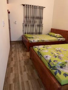 Postel nebo postele na pokoji v ubytování MOON Home