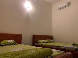 Postel nebo postele na pokoji v ubytování MOON Home + 10 fotografií