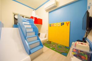 Een TV en/of entertainmentcenter bij Childlike B&B
