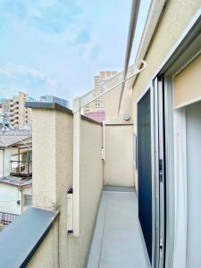 Balkon oz. terasa v nastanitvi サテライトホテル恵比寿 Satellite Hotel Ebisu