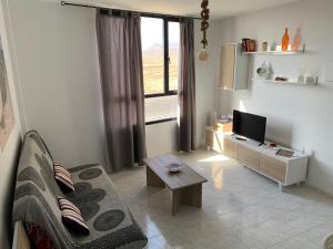 Telewizja i/lub zestaw kina domowego w obiekcie Casa Monny Fuerteventura Holiday Wi-Fi