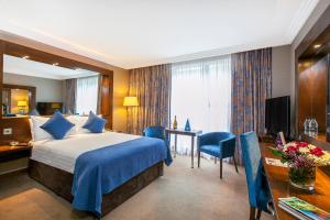 Cama ou camas em um quarto em Ashling Hotel Dublin