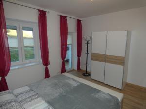 Postel nebo postele na pokoji v ubytování Gästezimmer Gombotz