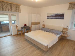 Postel nebo postele na pokoji v ubytování Gästezimmer Gombotz