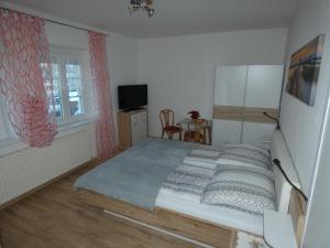 Postel nebo postele na pokoji v ubytování Gästezimmer Gombotz
