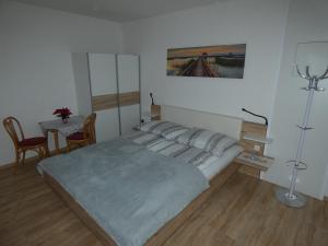 Postel nebo postele na pokoji v ubytování Gästezimmer Gombotz