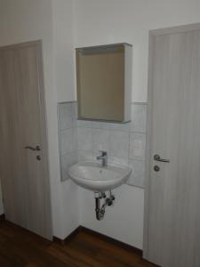 Koupelna v ubytování Gästezimmer Gombotz