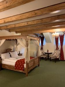 Un pat sau paturi într-o cameră la Hotel Villa Franca