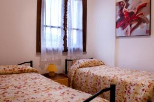 Voodi või voodid majutusasutuse Assia Spa toas