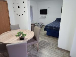 Postel nebo postele na pokoji v ubytování Apartman Borna