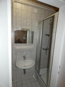 Koupelna v ubytování Gästezimmer Gombotz + 17 fotografií