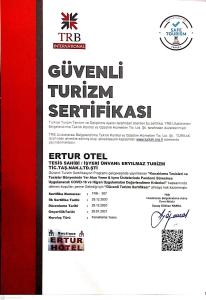 a flyer for a german seminar with a red ribbon at Butik Ertur Hotel in Doğubayazıt