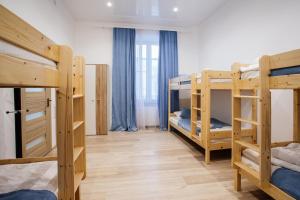 Postel nebo postele na pokoji v ubytování Discovery Hotel