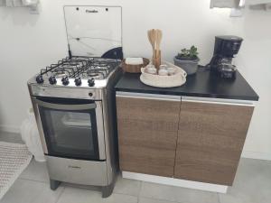 Dapur atau dapur kecil di Casa em Florianópolis