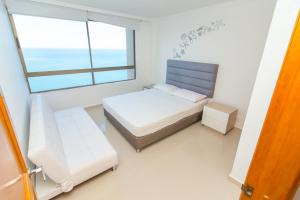 Postel nebo postele na pokoji v ubytování Apartamentos El Peñon - Frente al Mar by SOHO