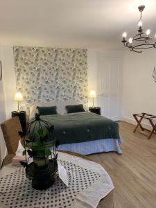 Postel nebo postele na pokoji v ubytování Chateau de la Saone